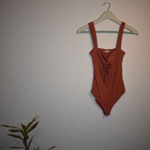 free people lace up body suit